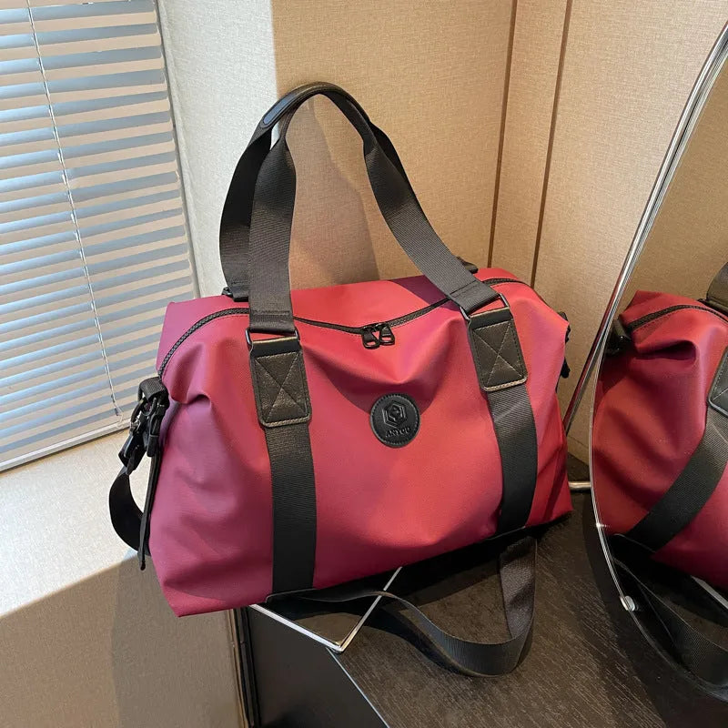 Waterproof Oxford cloth travel bag in solid colour with 36-55 litre capacity for short-distance trips