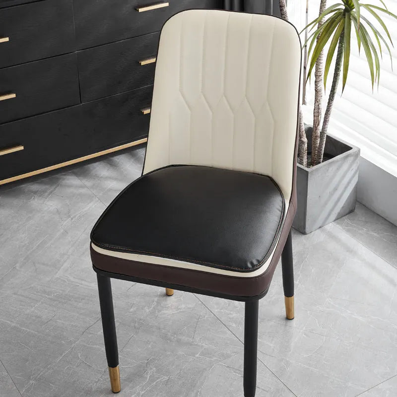 Horseshoe-shaped PU leather seat cushion in orange, shown on a chair.