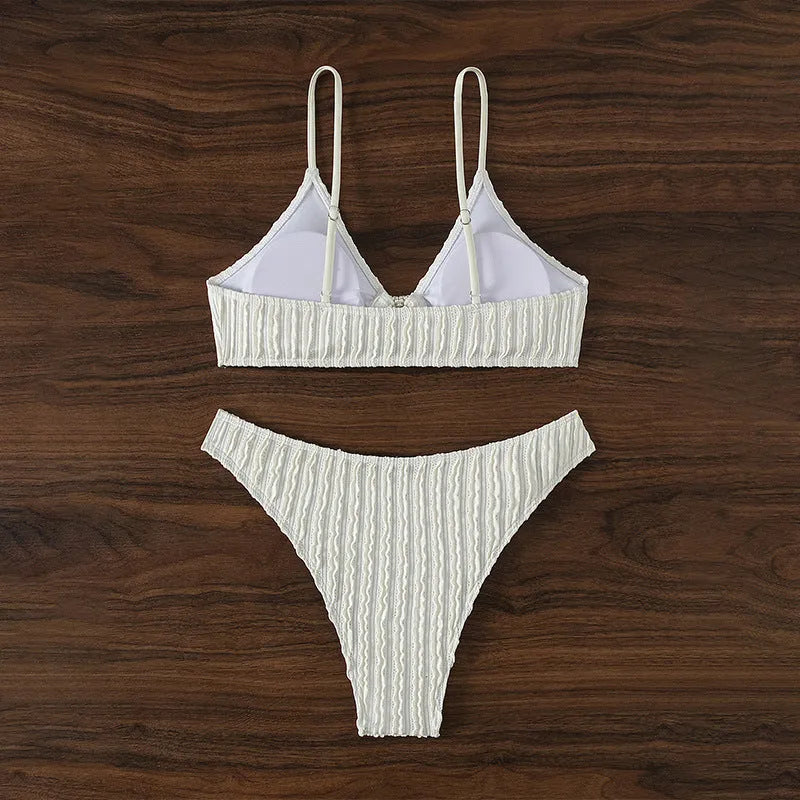 White women's V-neck sleeveless swimsuit with matching shorts for beach swimming