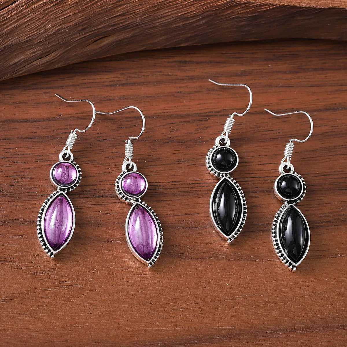 Vintage geometric pendant earrings with black and purple electroplated finish on zinc alloy.