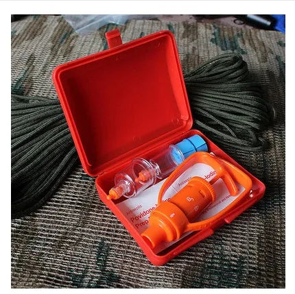 Orange emergency venom vacuum suction device with two cup sizes and accessories for outdoor bite treatment
