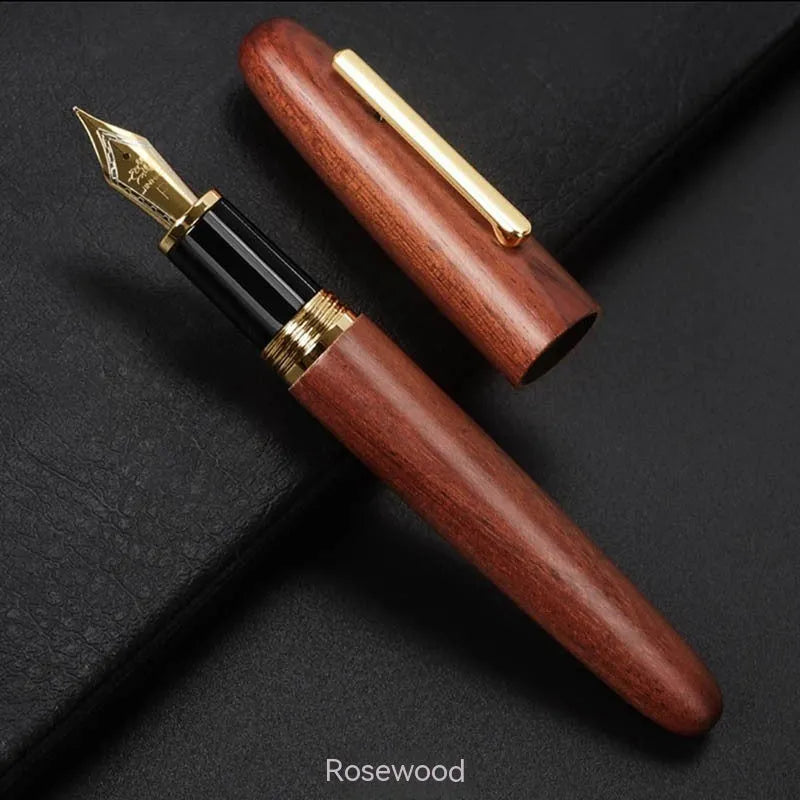 Wooden fountain pen with rotating cap showing natural wood grain