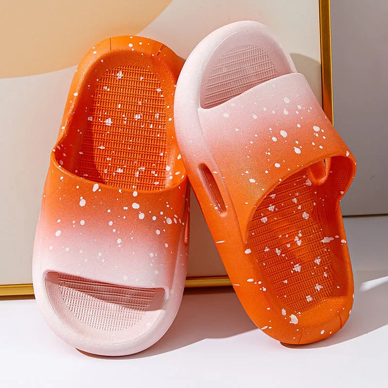 Gradient coloured PVC summer slippers for children on a non-slip sole.