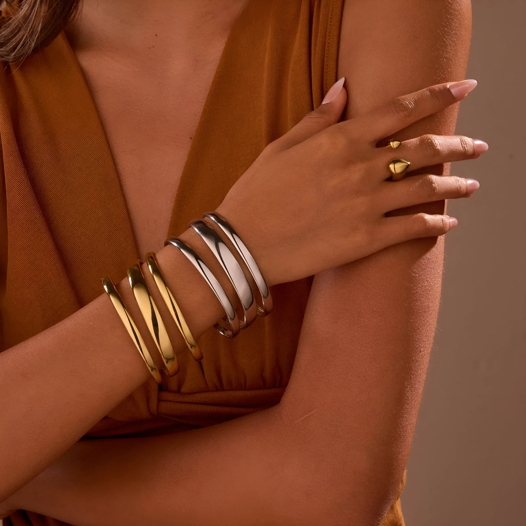 Women's geometric stainless steel bracelet with 18K gold electroplating in simple opening design