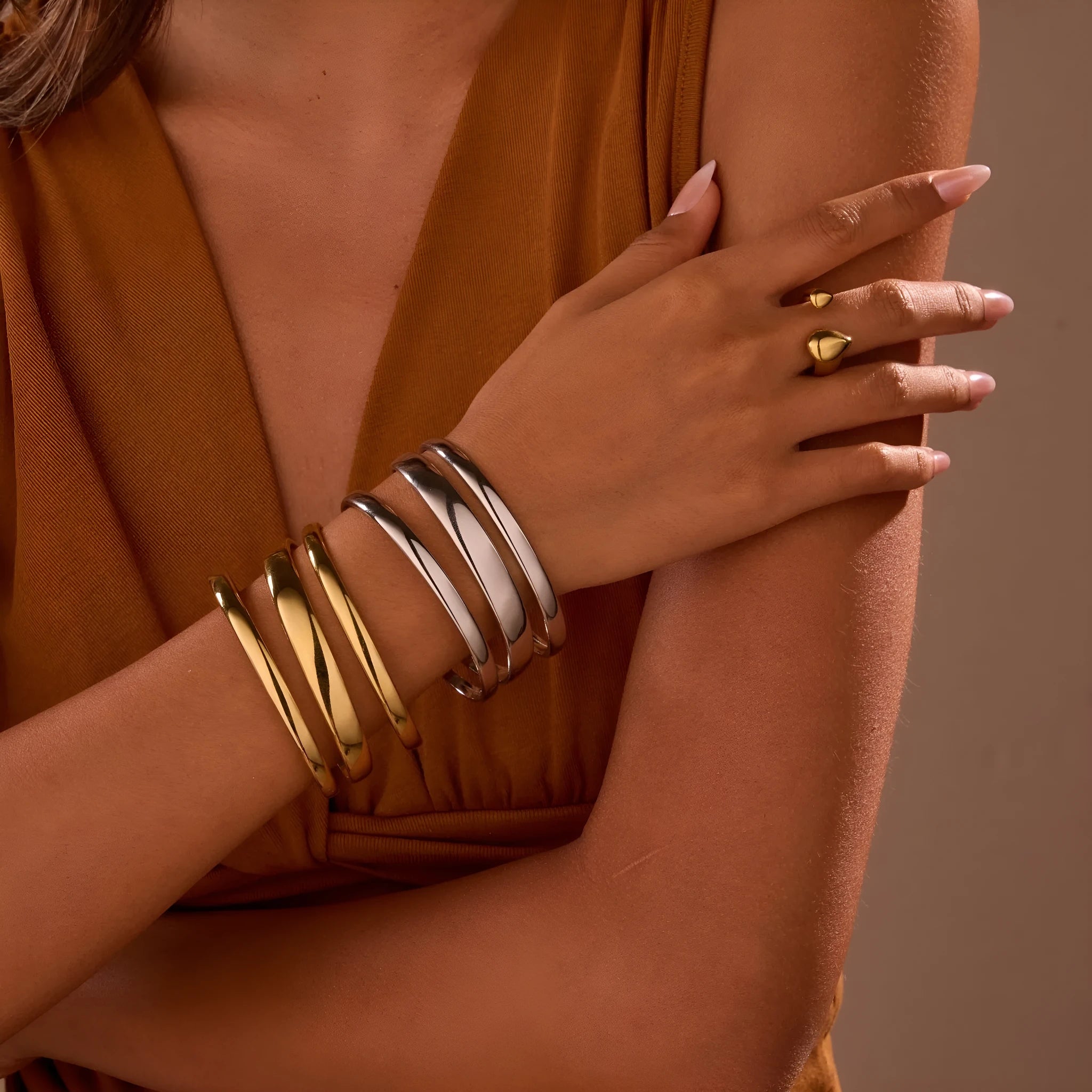 Women's geometric stainless steel bracelet with 18K gold electroplating in simple opening design