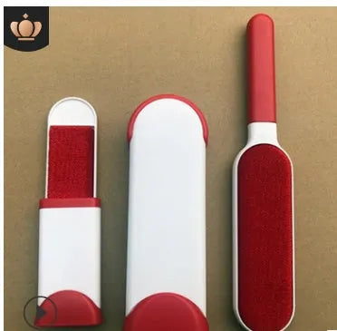 Reusable pet hair removal brush with double-sided roller and self-cleaning base