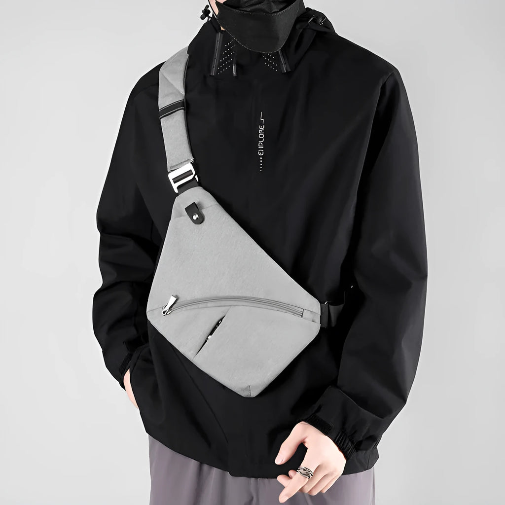 Men's Oxford cloth shoulder chest bag in grey colour with adjustable strap and letter detailing
