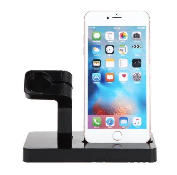 White 2-in-1 charging dock holding an iPhone and an Apple Watch on a wooden desk.