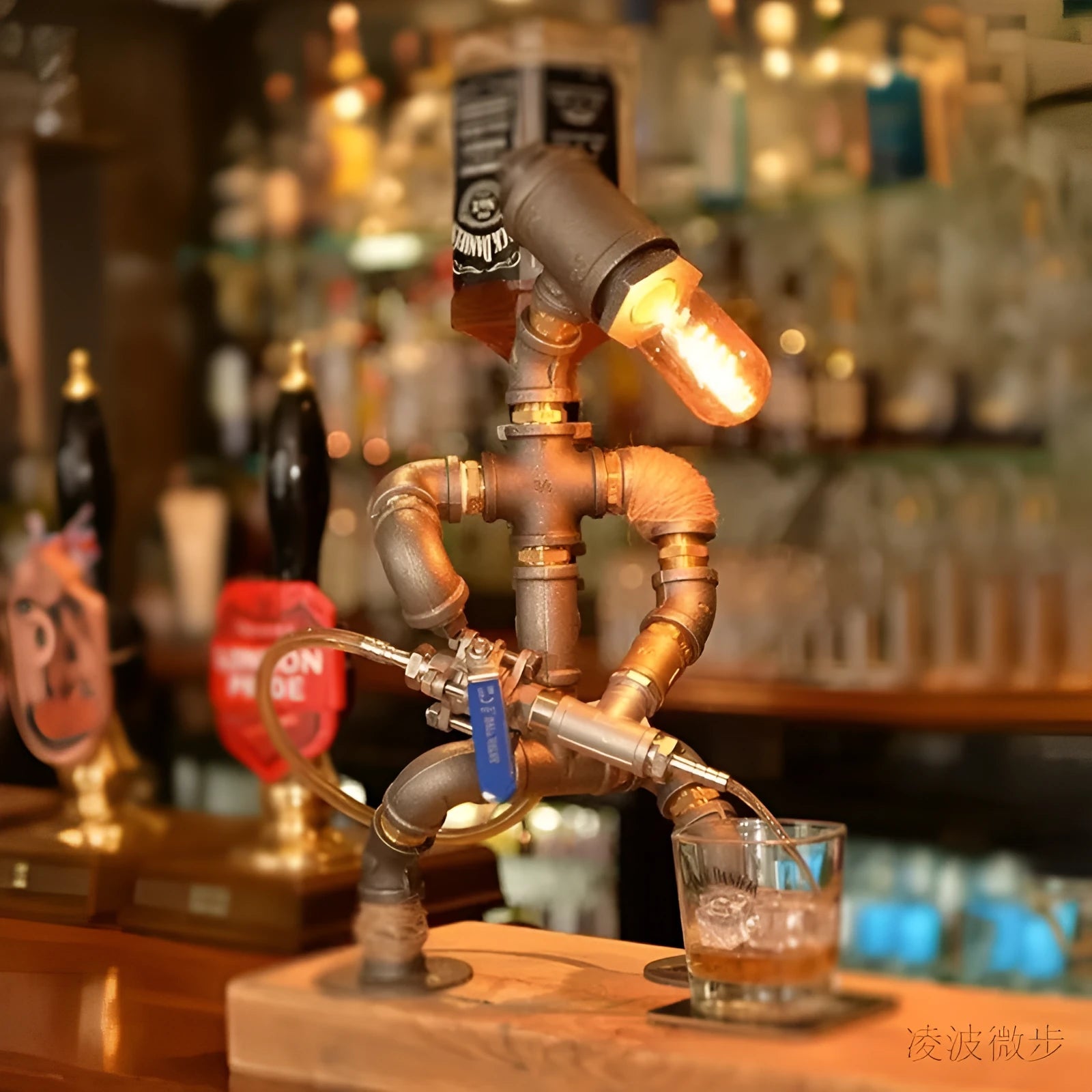 Industrial retro table lamp made from iron water pipes in vintage colour on a wooden desk