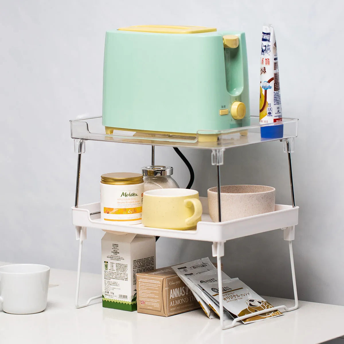 Plastic kitchen supplies storage rack in transparent or white colour