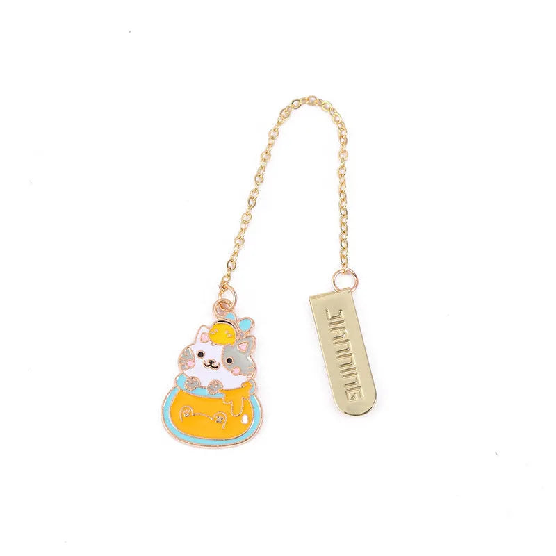 Metal bookmark with cartoon cat pendant in one of four designs measuring 3.8cm by 18.3cm