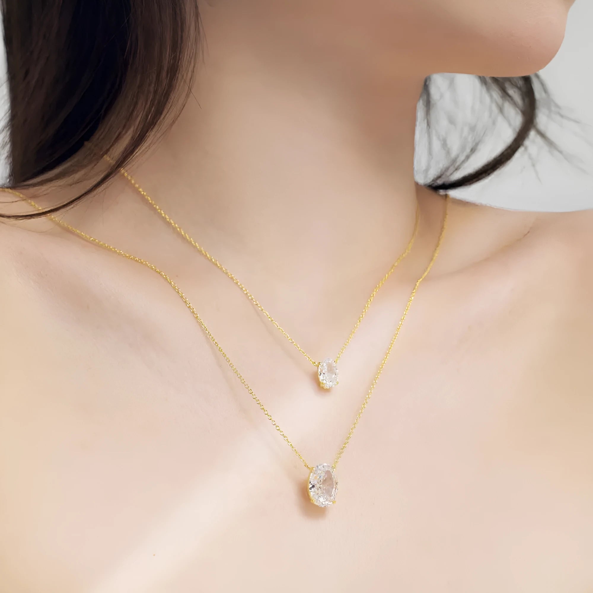 S925 sterling silver necklace with geometric oval ice flower pendant in gold or platinum plating.