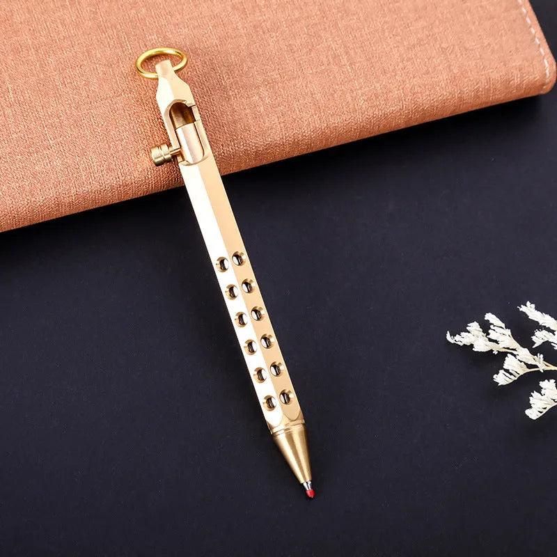Brass hexagonal bolt pen showing six-sided barrel and bolt detailing with 0.5mm rollerball tip