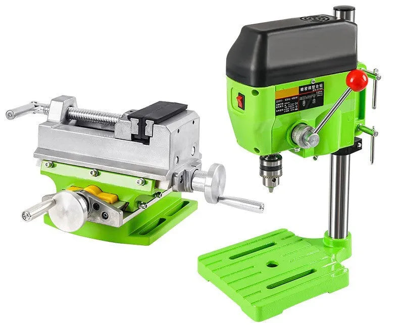 Mini bench drill milling machine with cross bench pliers on workbench