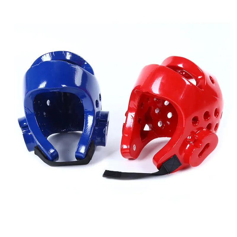Karate protective gear set with red boxing gloves, leg guards and helmet for martial arts training