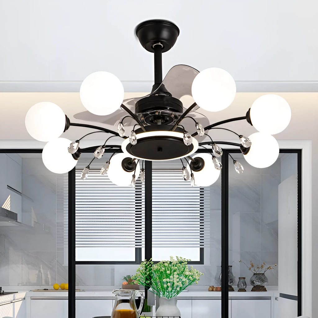 Gold finish ceiling fan chandelier with multiple lights and metal blades, shown installed in a living room.