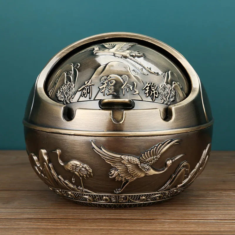 Alloy ashtray with smoke extinguishing slot in bronze finish featuring decorative dragon and phoenix design