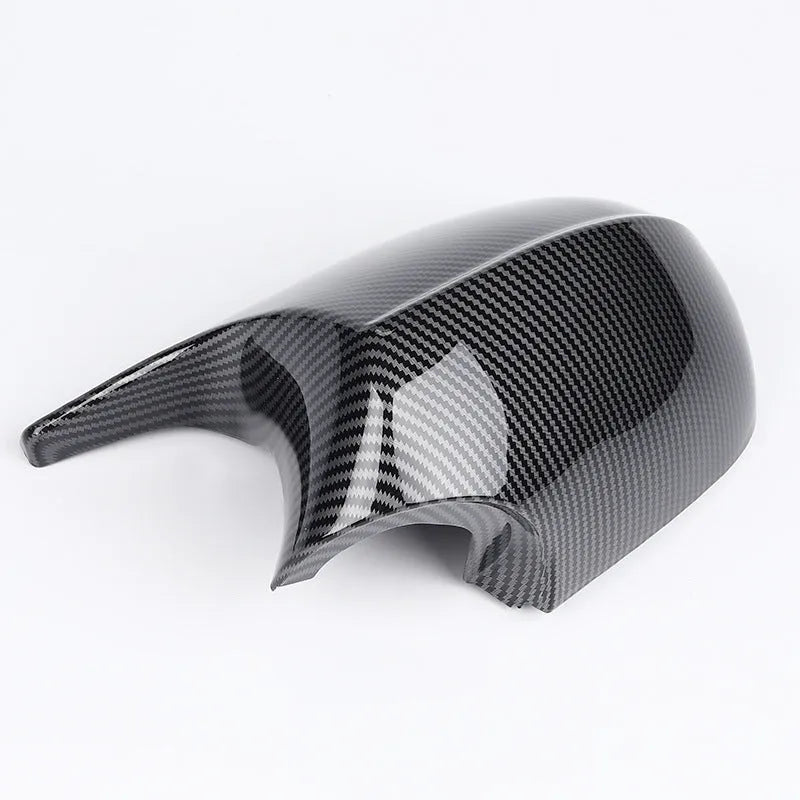 Pair of black ABS plastic rearview mirror housings for BMW 3 Series E90 model.