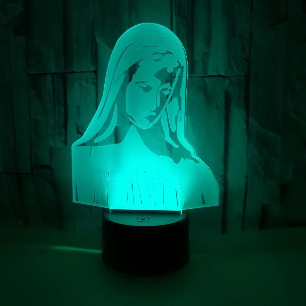 3D LED night light showing illuminated blue dual-ring pattern on acrylic plate with black ABS base.