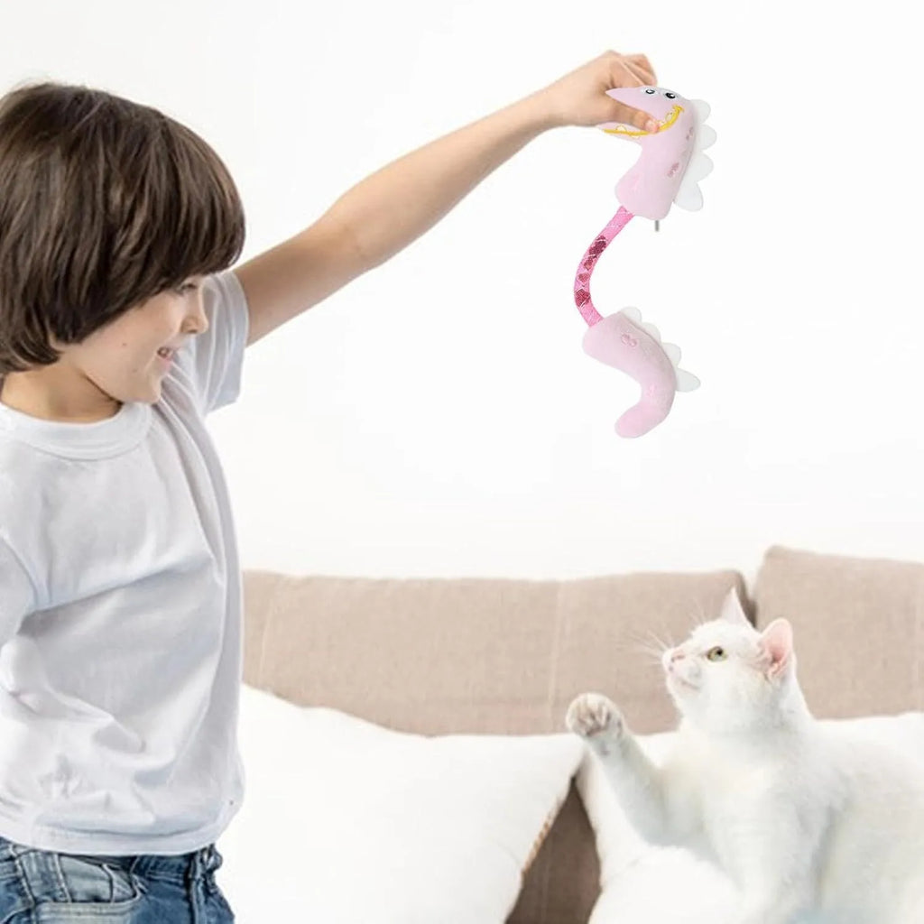 Four cat toys including rope, springs, and plush kicker toys in assorted colours