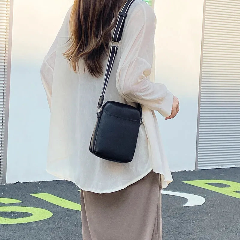 Solid colour simple PU crossbody shoulder bag for mobile phones in black, beige, khaki, or green.