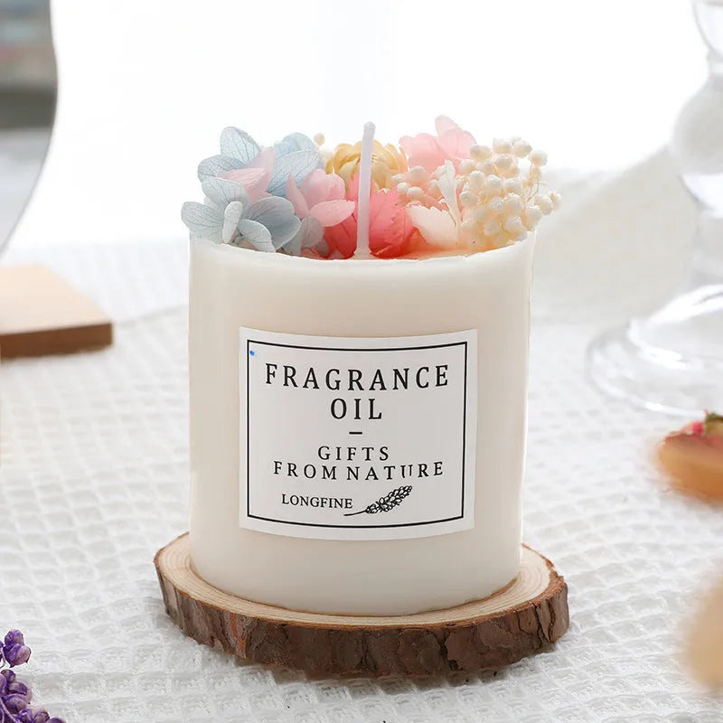 Scented aromatherapy candle with dried flower decoration and natural wood chip base