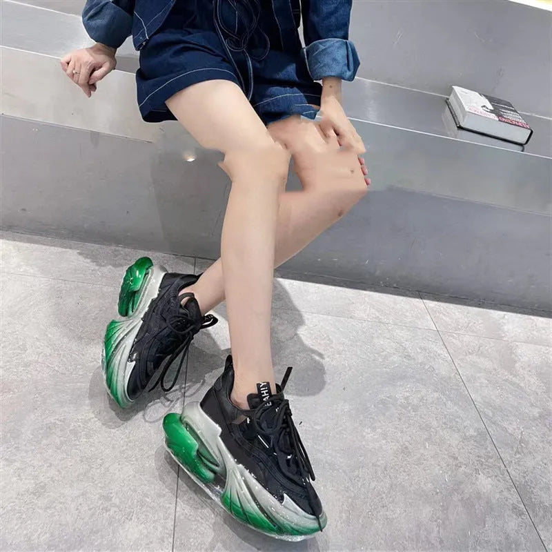 Women's leather casual sports shoes with thick jelly sole and cross-tie design in assorted colours.