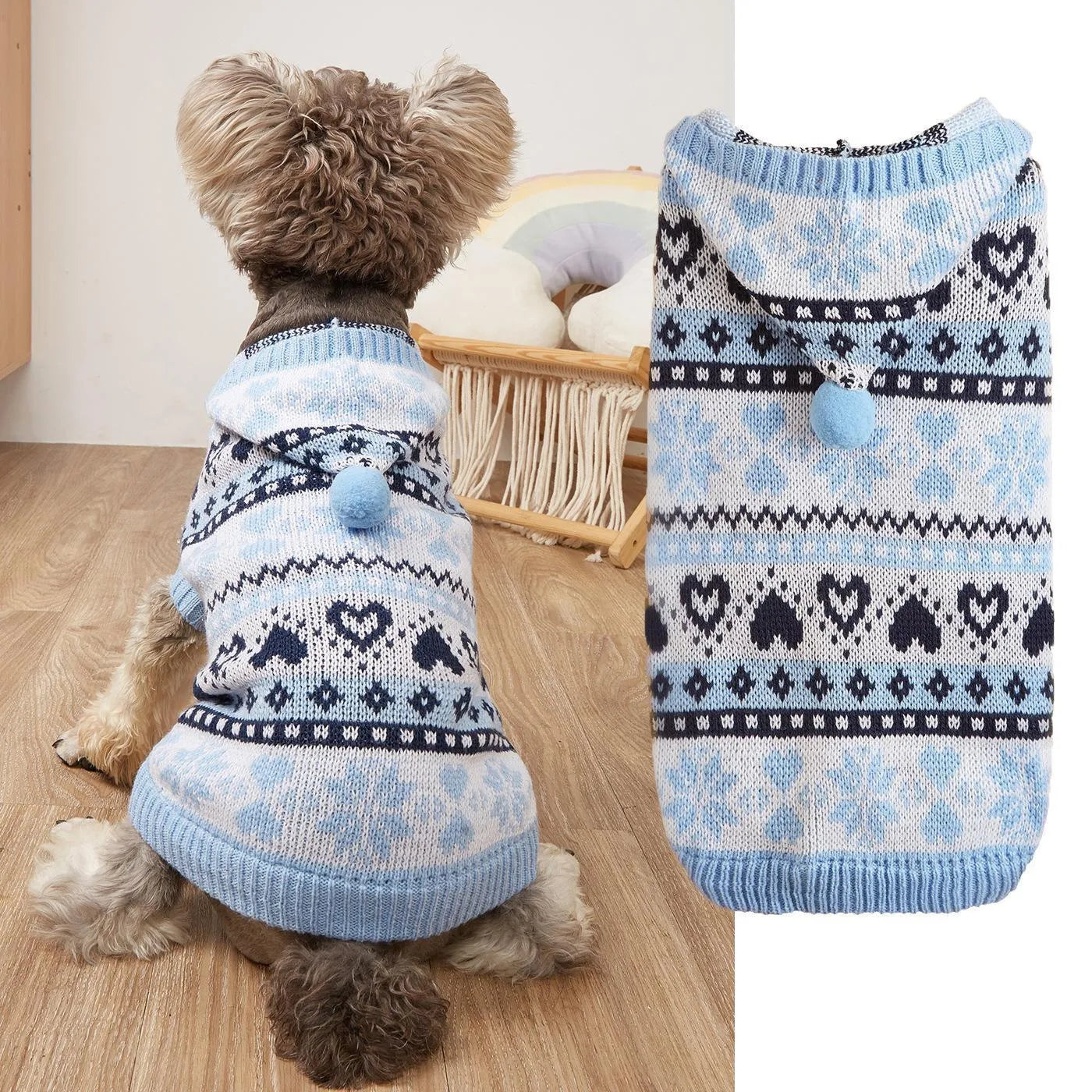 Pink knitted dog jumper with snowflake, love heart, and striped camouflage pattern on a small white dog.