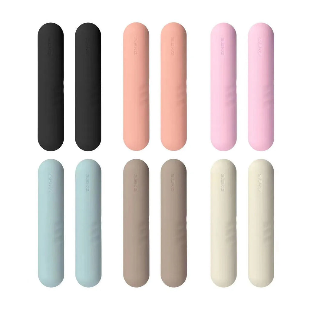 Silicone-edged hand-drawn dumbbell stick in a choice of colours including pink, green, and black, shown with cast iron weight.