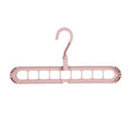 Plastic clothes hanger with rotating hook in assorted colours on white background