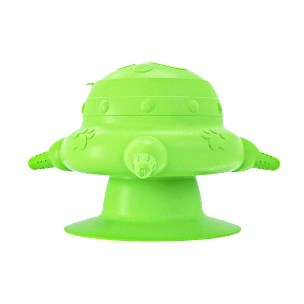 Pink silicone pet milk feeder with four nursing pacifiers and a lid on a flat base.