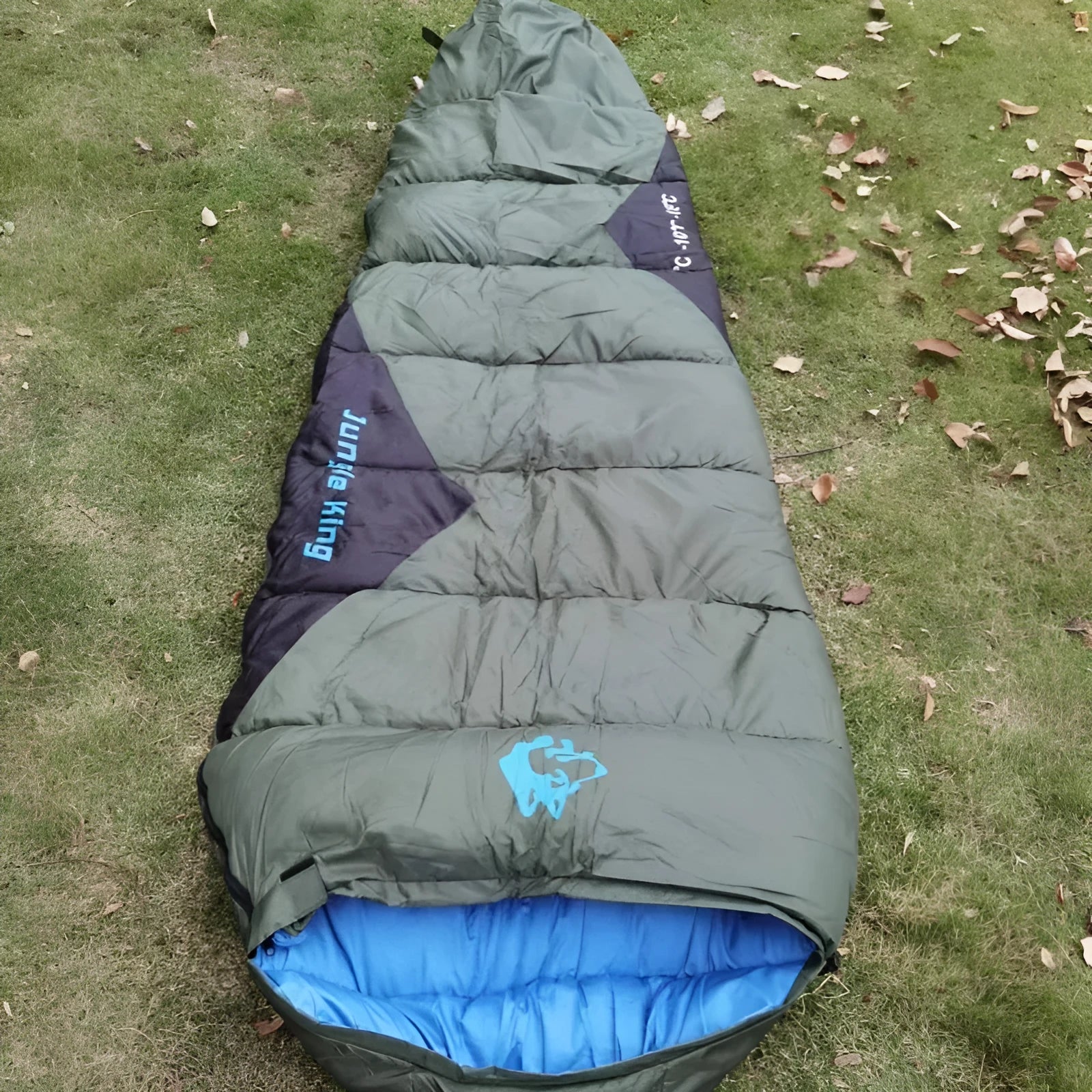 Mummy-style outdoor sleeping bag in army green with compression storage bag for camping