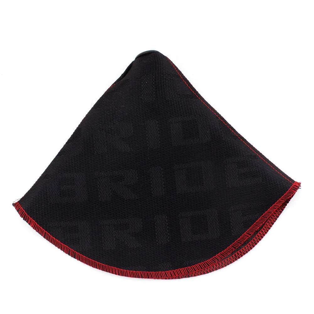 Canvas dust cover for Bride and Recaro racing seats shown in black with embroidered flag logo.