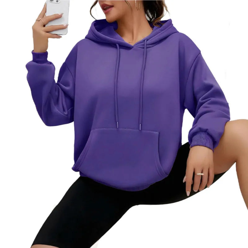 Women's loose fit grey drawstring hood sweatshirt with front pockets, long sleeves