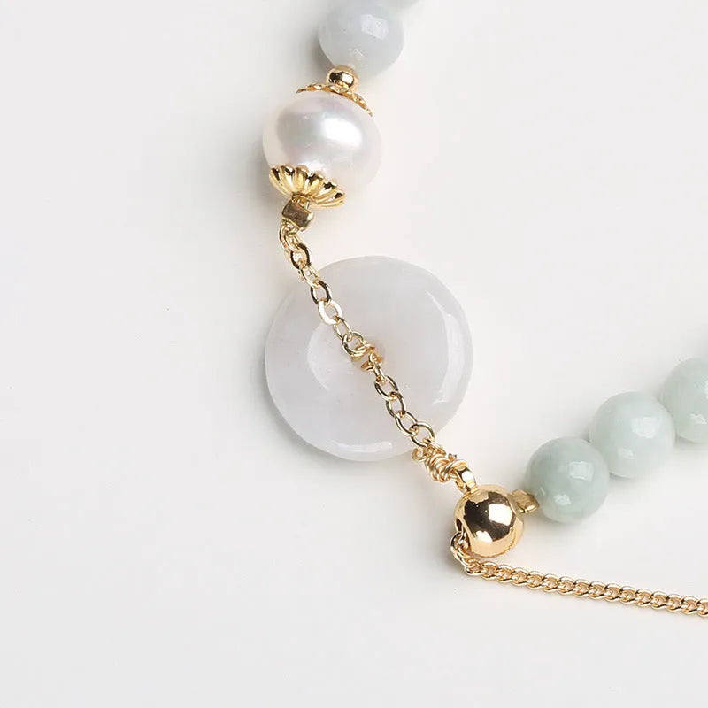 Emerald jade and pearl bracelet with peace symbol buckle on adjustable 20-22cm band