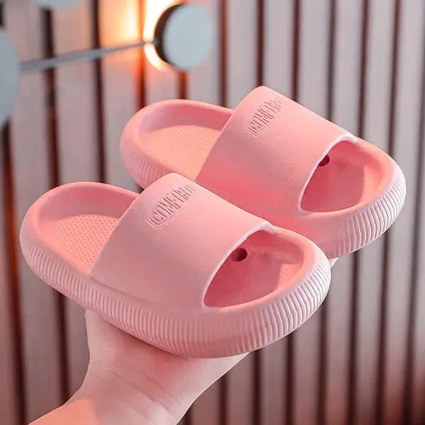Children's EVA slippers with non-slip soles in mixed colour options showing size range