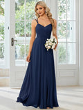 Women's light green sleeveless dress with sling neckline and long pleated A-line skirt.