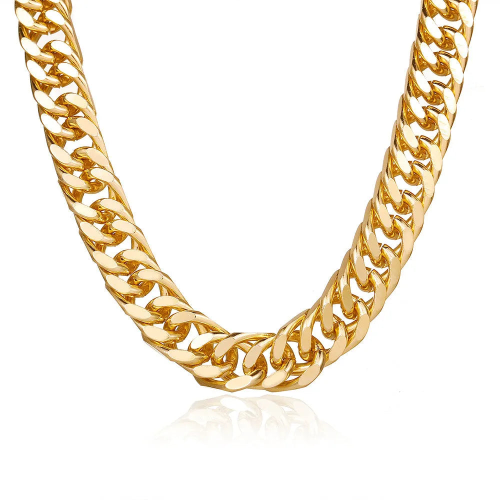 Gold-toned women's thick chain necklace with red accents, showing chunky 6cm wide links on a 32cm chain.