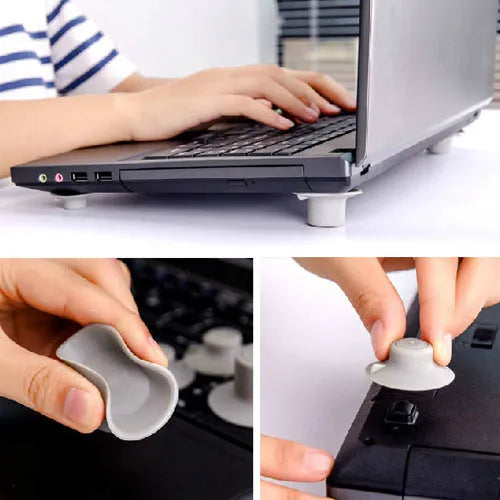 Four grey plastic laptop cooling pads: two large and two small, on a flat surface.