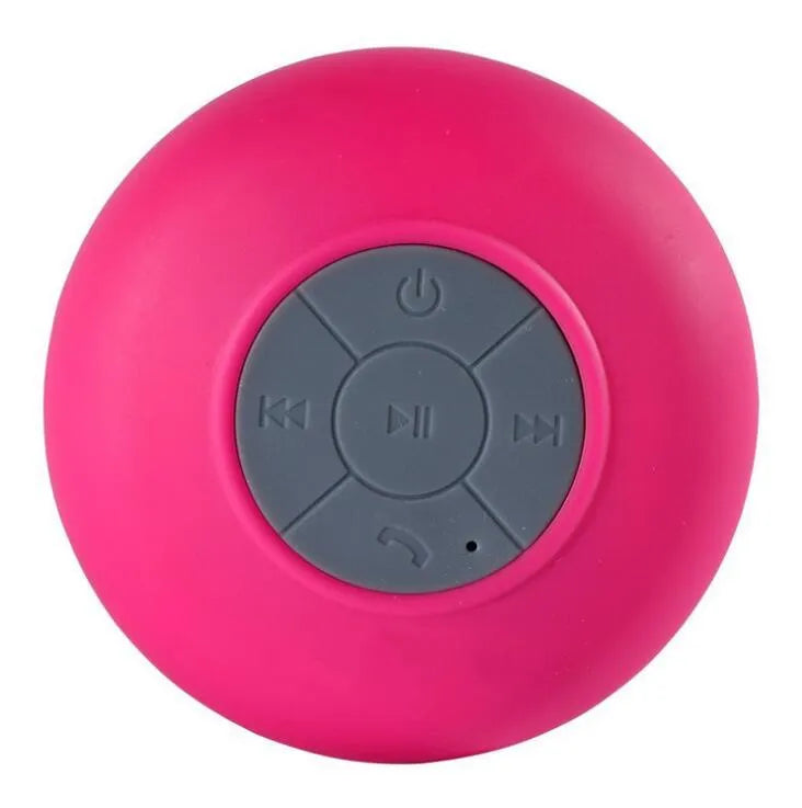 Portable Bluetooth speaker with suction cup showing front speaker grille and side buttons