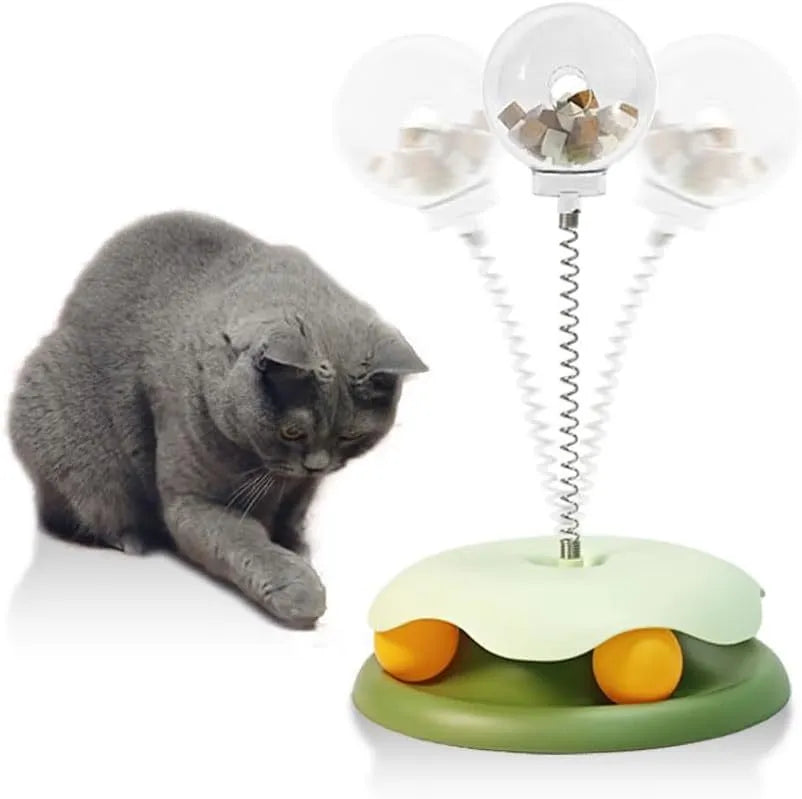 Blue interactive cat treat dispenser toy with track ball on a white background