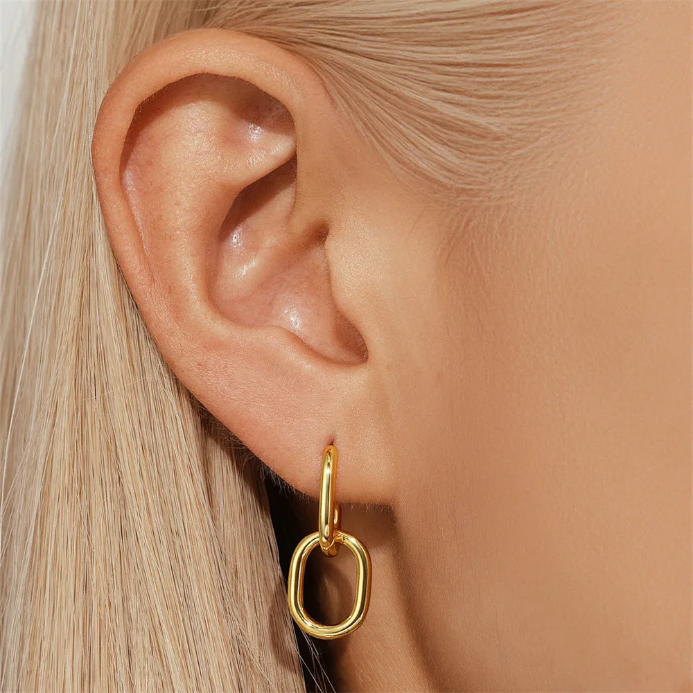 Gold electroplated brass earclip earrings with geometric round design in three style options
