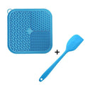Square orange and grey silicone dog licking mat with textured surface and suction cups on back.