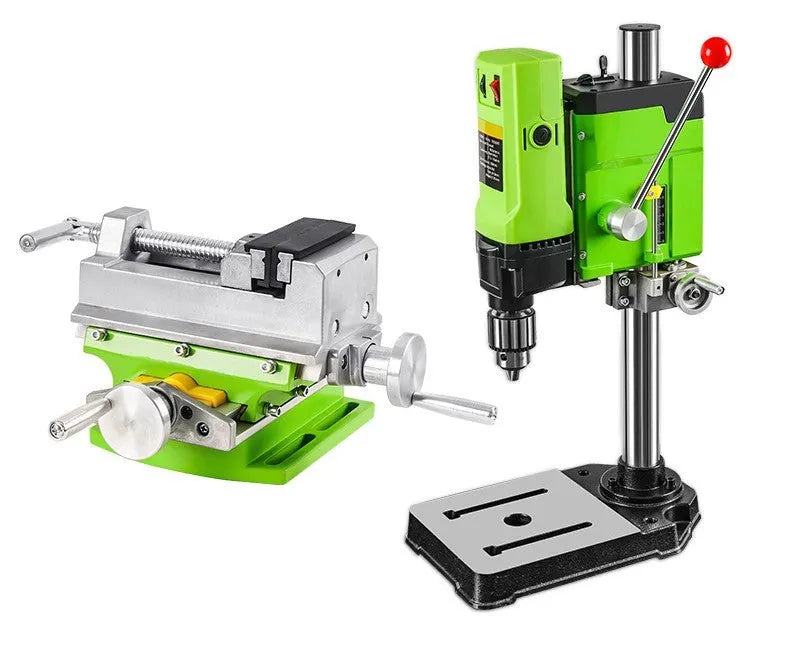 Mini bench drill milling machine with cross bench pliers on workbench