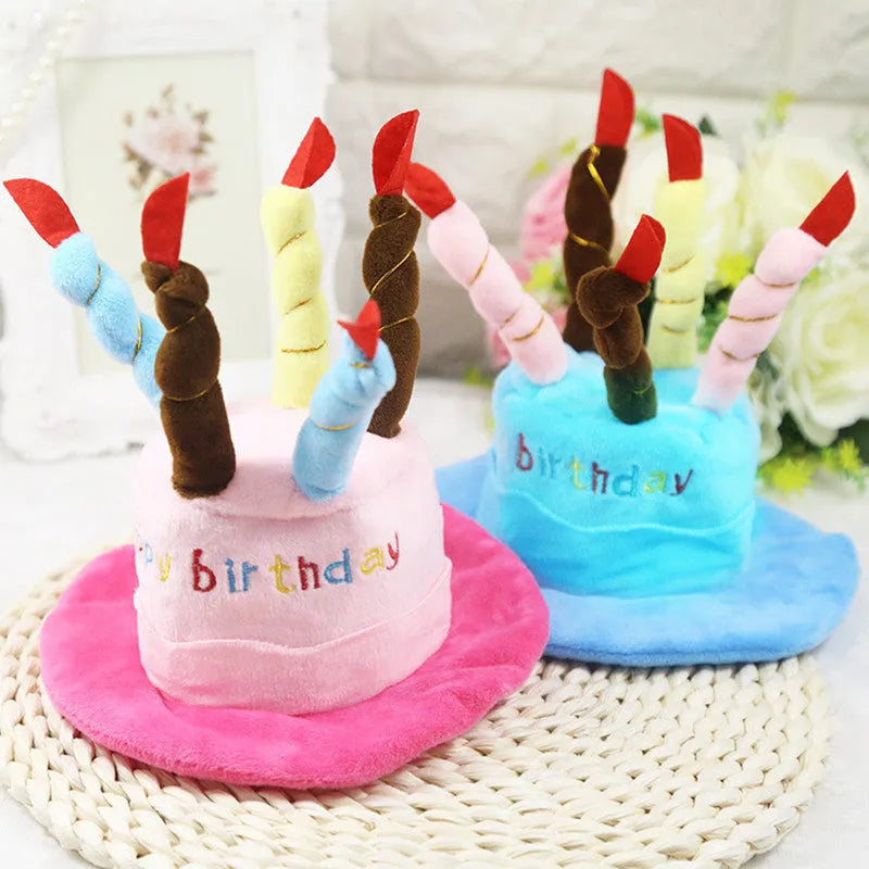 Blue and pink small dog birthday hats for toy breeds on a white background.