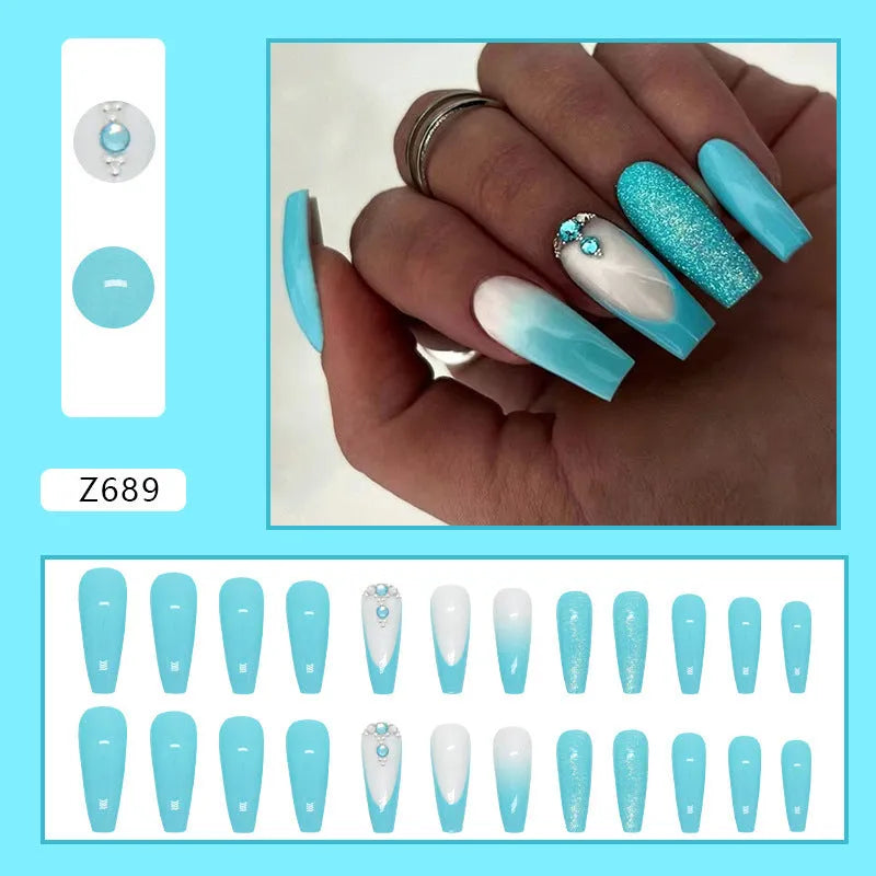 Long ballet nail art patches in smart blue diamond colour with scattered diamond debris detailing