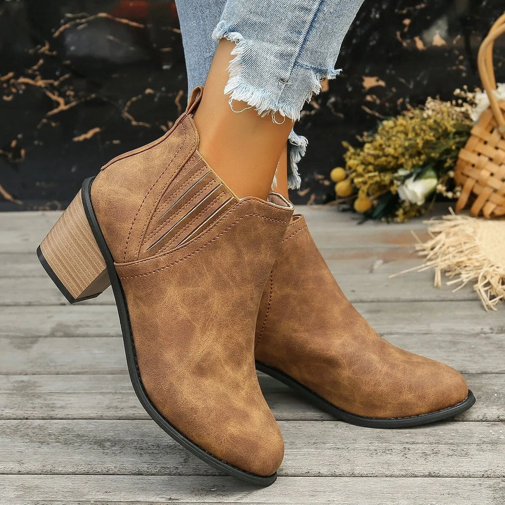 Women's black slip-on ankle boots with pointed toe and thick square heel for autumn winter wear