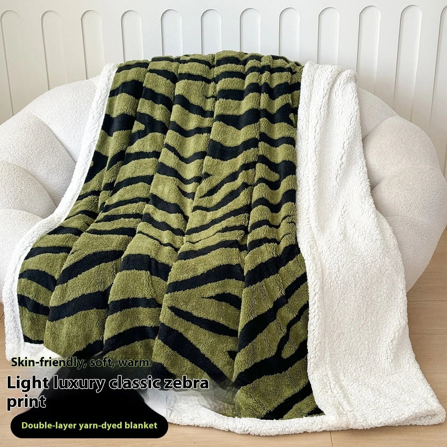 Double-layer leopard jacquard taffeta blanket in camel zebra pattern on a single bed.