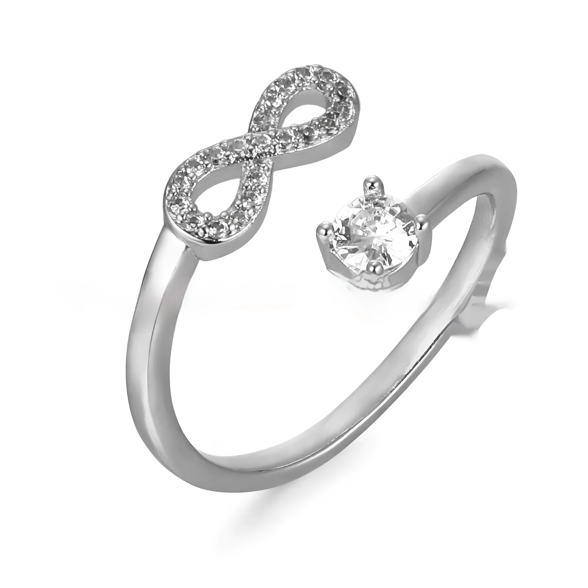 Geometric open metal ring with zircon stones displaying a single letter, available in gold, rose gold, and silver finishes.