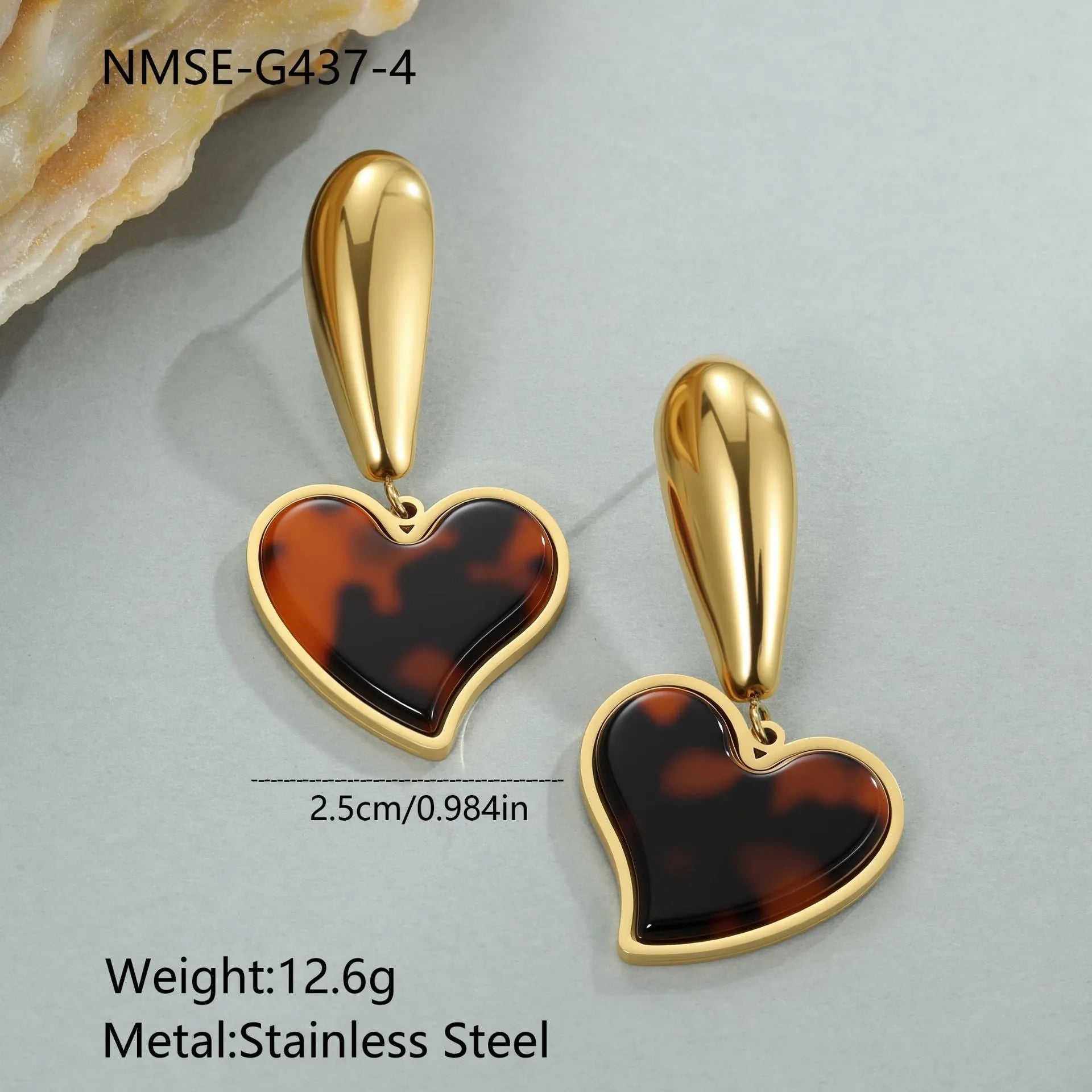Tortoiseshell resin hawksbill colour earrings with 18K gold electroplating, showing heart-shaped and flower geometric designs